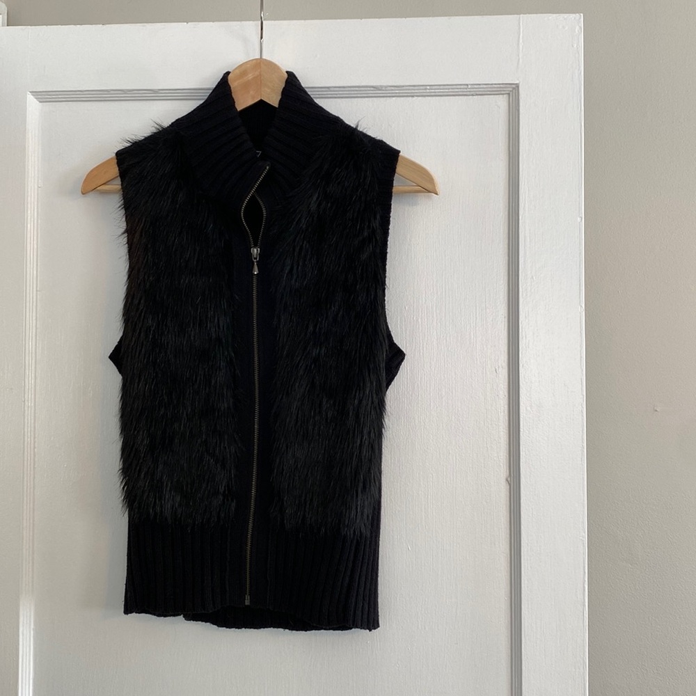 Black fur and sweater vest with buckles in back